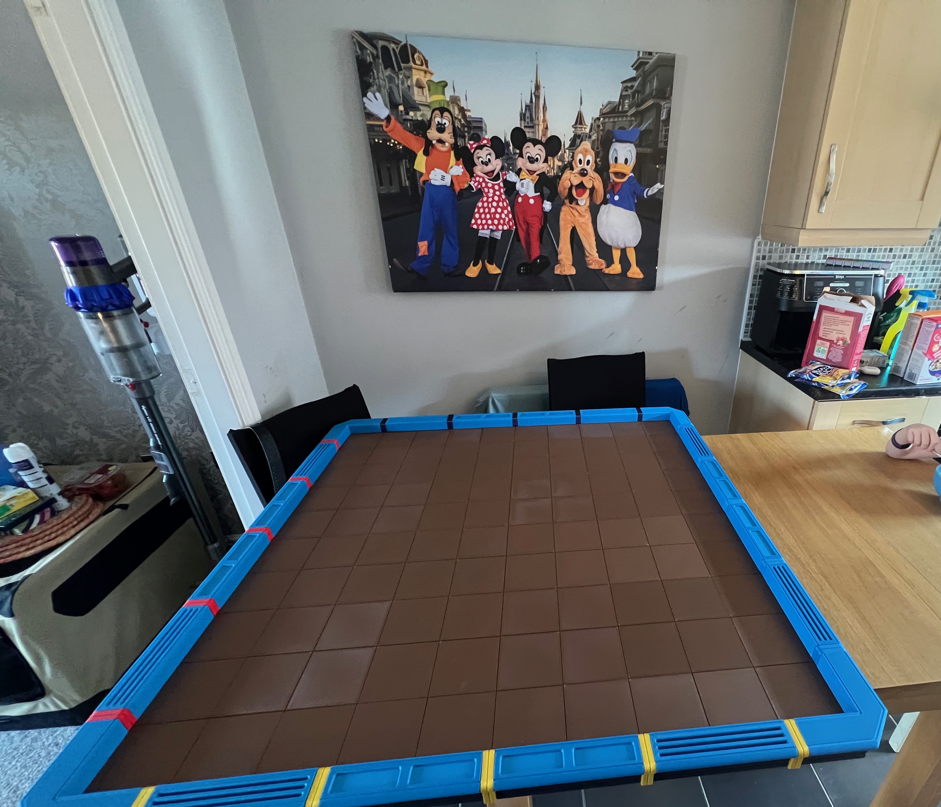 a gaming table on the kitchen table